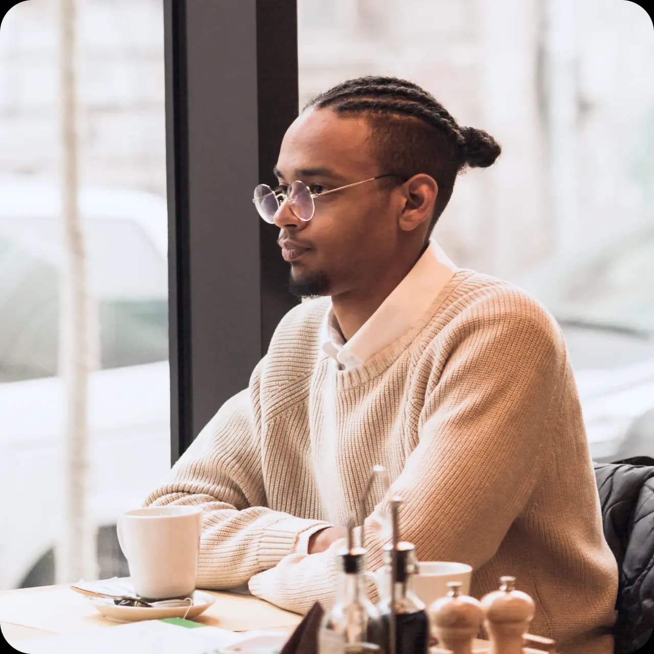 Person sitting at cafe